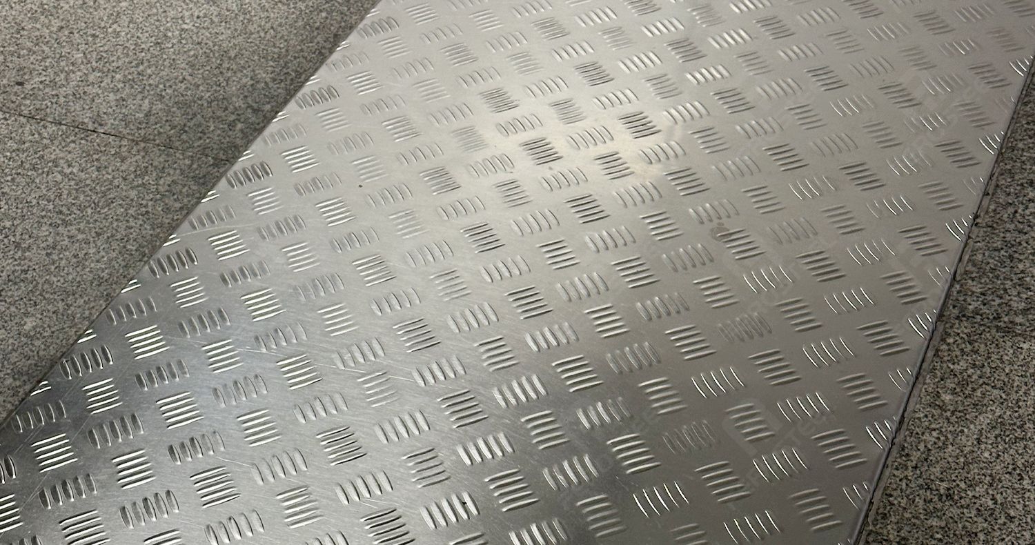 textured stainless steel wall panel design