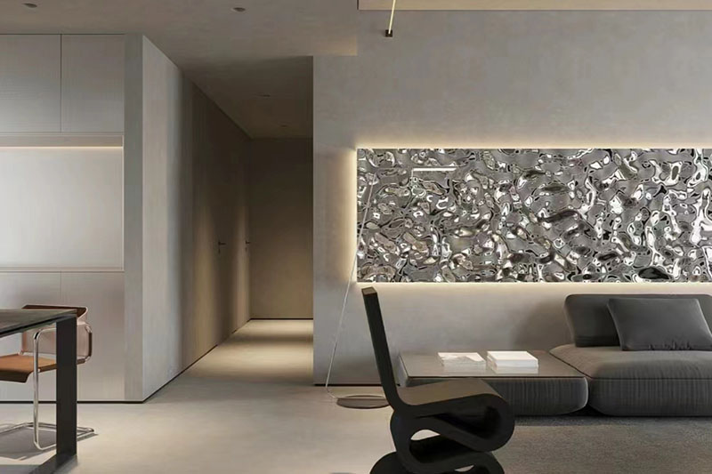 Silver water ripple wall panel installed in a modern open-plan living and dining space